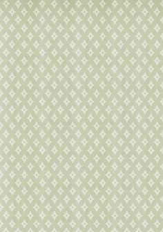 a green and white wallpaper with crosses on it