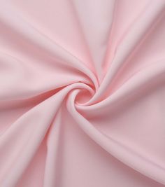 a close up view of a pink fabric