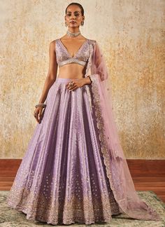 Light Purple Embroidered Lehenga Lavender And Purple Lehenga, Lavender Chikankari Lehenga, Light Purple Lehenga Color Combos, 2024 Lehenga Trends, Chanderi Traditional Wear With Sequins For Reception, Festive Embroidered Tissue Silk Lehenga, Chanderi Sequined Sets For Reception, Silk Lehenga With Sheer Dupatta For Diwali, Fitted Chanderi Sharara With Sequins