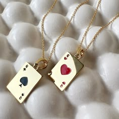 Get them solo or get the set! The set includes a playful pair of queen suited pendants, one for you and one for your bestie. The queen of hearts (♥) and queen of spades (♠) are neatly detailed in enamel. Pendants measure 15mm x 11mm. Chain is adjustable between 14" and 17.5". This is our grownup take on the classic friendship charm necklace and part of our BFF Charm Collection; tiny charms thoughtfully designed for you and your bestie. Each necklace in the two piece set is strung with a charm ha Queen Of Hearts Necklace, Marvel Script, Cards Necklace, Enamel Pendants, Tiny Charms, Bff Necklace, Sun And Moon Necklace, Bff Jewelry, Starburst Necklace