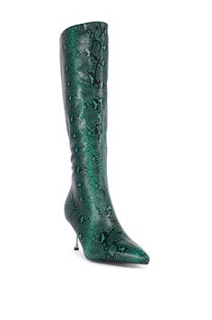 The AZALEA WANG Jacaranda Green Snake Embossed Embellished Heel Boot is a mid-calf boot featuring a textured faux leather upper with a beautifully embossed snake print, a pointed toe silhouette, a textured outsole, and a reflective metallic slim stiletto heel, detailed with opulent rhinestone embellishments. Complete with a padded fabric interior, a pull-on fit, and a tonal inner ankle zipper closure.   (all measurements are approximate from size 7.5) - Faux Leather Upper - Pointed Toe - Slim Stiletto Heel - Mid-Calf Shaft - 3.25” Heel Height  - 15.5” Shaft Height - 16.5” Top Shaft Circumference - Imported  Product ID: 427990 Azalea Wang, Green Snake, Embellished Heels, Heel Boot, Rhinestone Embellishments, Mid Calf Boots, Snake Print, Stiletto Heel, Emboss