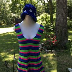 "This is one funky little mini from the 70's. The fabric is a poly/jersey blend and the design is bold colored stripes...hot pink, lime green and royal blue. Scoop necked with zipper down back. It could be worn as a mini dress or as a fun top with leggings. Hand made many years ago, still in nice wearable shape. Measurements: 36\" bust; mid body 33\"; 38\" hips; 51\" hemline; 32 1/2\" tall. Thanks for stopping by my Etsy shop!" Retro Striped Mini Dress, Multicolor Mod Mini Dress, Sleeveless Multicolor Retro Print Mini Dress, Fitted 1970s Mini Dress, 60s Striped Dress, Striped Mini Dress, Little Dresses, Nice Tops, Striped Dress