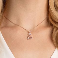 Introducing the Dazzling Swan Rose Gold-Plated Y-Necklace, a graceful piece of elegant crystal jewelry that seamlessly combines timeless beauty with a stunning design. This exquisite necklace features a meticulously crafted pendant adorned with shimmering Swarovski crystals, delicately set in the shape of a swan, and suspended from a delicate Y-shaped chain. The Dazzling Swan Y-Necklace is more than just a necklace; it's a symbol of sophistication and the elegance of nature. The swan motif adds Swarovski Swan Necklace, Elegant Crystal Jewelry, Luxury Accessories Woman, Swan Necklace, Swarovski Swan, Swarovski Necklace, Design Luxury, Crystal Jewelry, Rose Gold Plates