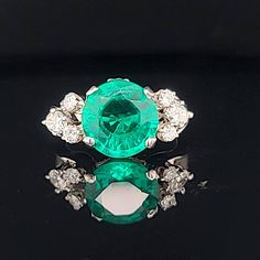 GORGEOUS Vintage 14K WHITE GOLD gem green  lab  grown emerald in round  shape,center weight 3.05ct. size 10mm very nice rich vivid green color  nice luster, very lively ,nice cut.clean emerald.brilliant ,sparkly emerald.  side six diamonds total weight 0.45ct. G-SI1  ring size 5 Resizable  Appraisal available  Retail value $5,500 net . Formal Solitaire Emerald Ring, Timeless Green Diamond Round Ring, Gia Certified Green Diamond Ring In Vintage Style, Vintage Green Emerald Ring Gia Certified, Emerald Ring Brilliant Cut May Birthstone, Emerald Ring Brilliant Cut For May Birthstone, Emerald Ring For May Birthstone In Brilliant Cut, May Birthstone Round Brilliant Cut Diamond Ring, May Birthstone Brilliant Cut Diamond Ring