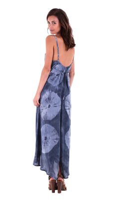 Sexy and elegant. This flowy asymmetrical maxi dress with spaghetti straps is loose and comfortable. Perfect to wear on a date, a stroll on the beach, or on a tropical vacation. Love your style with this beautiful print dress. Deep V neck Lightweight and flowy 100% soft rayon Spaghetti straps Summer V-neck Maxi Dress With Adjustable Straps, Floor-length Tie Back Maxi Dress For Beach, Sundress Style Maxi Dress With Spaghetti Straps, Summer Maxi Dress With Tie Back, Summer Rayon Maxi Dress With Tie Back, Casual Maxi Dress For Beach Wedding, Chic Flowy Maxi Dress For Beach Wedding, Flowy Summer Maxi Dress With Tie Back, Casual Flowy Maxi Dress With Adjustable Straps