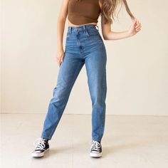 Let Loose With This Modern Interpretation Of A Classic 90s Style. This Jean Features A Flattering High Rise, 5-Pocket Styling, Zipper Fly And Stacked, Tapered Leg. It's Designed To Be Worn As A Relaxed, Loose Style. Sustainably Made With Tencel Fabric. Fabric: Non-Stretch 79% Cotton, 21% Lyocell Mom Jeans Size 30 Mom Jeans High Waisted, Tapered Mom Jeans, High Waist Mom Fit Pants For Everyday, High-waisted Mom Fit Pants For Everyday, Everyday High Waist Mom Fit Bottoms, Blue Mom Fit Bottoms For Everyday, Everyday Blue Mom Fit Bottoms, Everyday Levi's Blue Bottoms, Mom Jeans Levis