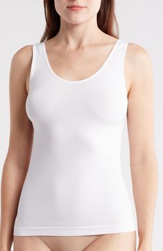 A reversible design lends versatile styling options for this soft and stretchy seamless tank. V-neck Fixed straps 95% nylon, 5% spandex Machine wash, tumble dry Imported Stretch Soft Touch Camisole Top, Micro-elastic Seamless Tops For Summer, Stretch Camisole Top With Soft Touch, Seamless Micro-elastic Tops For Summer, White Elastane Tank Top With Built-in Bra, White Compressive Seamless Tops, Fitted Sleeveless Tops With Soft Touch, White Stretch Tank Top With Wide Straps, Fitted Sleeveless Soft Touch Top