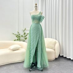 This one-shoulder evening dress radiates luxury and elegance with its sage green color and exquisite design. Perfect for weddings, formal events, and parties, this dress combines style and sophistication. Look and feel like royalty in the beautiful and unique luxury Dubai dress. window.adminAccountId=244214477; Green Evening Dress For Banquet During Prom Season, Green One Shoulder Floor-length Evening Dress, Green One-shoulder Floor-length Evening Dress, Green One-shoulder Evening Gown, Green Evening Dress With Asymmetrical Neckline For Gala, Green Off-shoulder Formal Gown, Green One-shoulder Gown For Gala, Elegant Green One-shoulder Dress For Formal Occasions, Green One Shoulder Dress For Prom Season