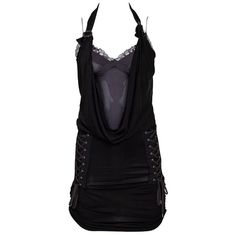 Discover The Edgy Elegance Of The Christian Dior Lace-Up Cowl Black Bodycon Halter Dress, Size Fr 36. Designed By John Galliano In 2004, This Striking Piece Features Signature Dior Star Buckle Accents, A Unique Cowl Neckline, And A Silk Slip Beneath. The Dress Showcases The Dior Logo On The Side, With Cinching Details, Spaghetti Straps, And A Halter Neckline. Recommended For U.S. Sizes Xs/S, It Measures Bust 26.75", Waist 26", Hip 23", And Length 34.75". The Dress Shows Some Wear, Including Loos Bodycon Halter Dress, Edgy Elegance, Dior Star, Dior Collection, Dior Logo, Cowl Neckline, Silk Slip, Black Bodycon Dress, John Galliano