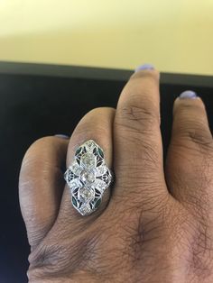 20k White Gold Ring, with 9 diamonds totaling approximately .50ct. SI2 clarity j- k colors. 4 emeralds Marquise shape totaling approx. 1/3ct. Circa 1920s-1930s. Ring is a size 7 but can be sized up or down two sizes at no additional cost. Heirloom Emerald-cut Ring With Single Cut Diamonds, Heirloom Emerald Cut Ring With Single Cut Diamonds, Art Deco Diamond Emerald Ring With Brilliant Cut, Art Deco Emerald Ring With Rose Cut Diamonds, Art Deco Emerald Ring With Diamond, Art Deco Green Emerald Ring With Rose Cut Diamonds, Art Deco Multi-stone Platinum Diamond Ring, Art Deco Emerald Diamond Ring With Accents, Anniversary Multi-stone Emerald Cut Diamond Ring