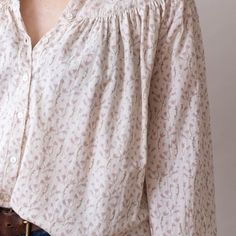 About Our Isobel top is super soft, flowy, oversized and flattering on everyone. S/M: 21.5" wide, 22" long L/XL: 24" wide, 24.5" long 100% lightweight cotton Block printed with non-toxic, azo free dyes Process Our designs are hand carved into teak wood blocks, and then hand block printed onto soft cotton. We use water based, non-toxic, AZO-free dyes. Every step of our production is done by hand in small batches by a network of artisans in Jaipur. Care -Machine wash cold with like colors-Dry on l Chic Floral Print Blouse For Loungewear, Chic Blouse With Floral Print For Loungewear, Effortless Fall Daywear Blouse, Billowy Feminine V-neck Top, Feminine Cotton Blouse For Layering, Beige Relaxed Fit Blouse For Layering, Spring Bohemian Blouse For Loungewear, Beige Feminine Blouse For Layering, Billowy Tops For Daywear In Fall