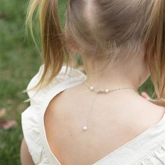 She is one lucky little lady! A petite (fits on a dime) shiny sterling silver four-leaf clover charm mingles with a gorgeous freshwater pearl and her very own special birthday gem. A wonderful and lovely reminder that she always carries her very own luck with her, on all of her adventures. Her lucky charm necklace includes: sterling clover charm (from tippy-top to bottom, a bit smaller than a dime) cultured freshwater pearl charm genuine birthday gem dangle charm [split] Details about your neckl Pearl Charm Necklace For Birthday And Mother's Day, Pearl Jewelry For Birthday And Mother's Day, Hypoallergenic White Gold Jewelry For Birthday, Pearl Charm Jewelry For Birthday On Mother's Day, Dainty Pearl Jewelry For Birthdays, Elegant Birthstone Charm Necklaces For Birthday, Elegant May Birthstone Jewelry For Birthday, Dainty Pearl Jewelry For Birthday, White Pearl Charm Necklace For Birthday