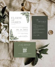 an elegant wedding suite with greenery and calligraphy