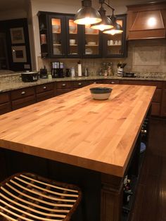 a large wooden counter top in a kitchen