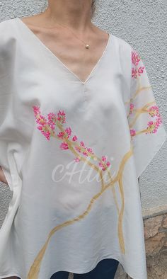 Limited, unique, hand painted silk-viscose tunic with pink Bougainvillea. You will be special wearing this clothes. The item made of silk-viscose fabric, it is pleasant to wear in the summer heat. Hand painted and sewing by me.  Dry-cleanable or handwash only and please don't tumble dry! Handmade item. There is a seam on both side. You can see in the last picture all windths and lengths. The whole length is 70 cm. If you have any questions, please contact me. https://www.instagram.com/p/C8oW6O3o Silk V-neck Tunic For Summer, Casual Silk Kaftan For Spring, Silk Tunic For Spring Vacation, Spring Vacation Silk Tunic, Silk Tunic For Spring Beach Days, Silk Summer Tops With Floral Embroidery, Summer Floral Embroidered Tunic, Spring Silk Tunic, Spring Silk Kaftan With Floral Embroidery