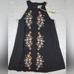 Savanna Jane Tunic Dress Floral Embroidered Sz M Black Halter Neck Lined. Keyhole Back Spring Floral Print Embroidered Mini Dress, Black Floral Embroidered Summer Dress, Spring Mini Dress With Multicolor Floral Embroidery, Spring Mini Dress With Multicolor Embroidery And Floral Print, Embroidered Black Summer Dress, Black Embroidered Beach Dress For Spring, Spring Beach Black Embroidered Dress, Spring Beach Embroidered Black Dress, Black Floral Embroidered Beach Dress