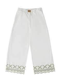 A lightweight pant with a relaxed fit, perfect for pairing with the matching Sophie Shirt or wearing on its own. Whether you're dressing up for a holiday away, or going for a more relaxed look, this pant is ideal for versatility and comfort. This is a relaxed fit trouser, if you would like a smaller fit please size down. Elasticated waist. Embroidered hem. Pockets. Nadia is 170cm and a size UK 6/8. She is wearing a S. Fabric & Care: Made with 95% certified organic cotton and 5% recycled cotton, all helping to reduce its carbon footprint and water consumption. Relaxed Cotton Straight Pants, Relaxed Straight Cotton Pants, Relaxed Wide Leg Cotton Bottoms, Summer Cotton Jeans With Elastic Waistband, Summer Cotton Straight Leg Wide Pants, Relaxed Wide-leg Cotton Bottoms, Relaxed Cotton Trousers, Summer Straight Leg Wide Cotton Pants, Cotton Wide Leg Pants For Day Out