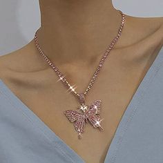 Rhinestone Pendant Necklaces Chain Sparkly Butterfly Short Necklace Is Made Of High Quality Alloy And Rhinestone , It's Strong And Durable ,Doesn't Turn Your Neck Green At All.If You Want To Have A Necklace Suitable For Matching, This Necklace Is Your Ideal Choice Shiny Butterfly Necklace Has 2 Line Extension Chain, You Can Adjust It To Your Own Size So As To Let This Concise Necklace Around Your Neck Perfectly. Package Dimensions : 4 X 3 X 0.1 Inches; 0.35 Ounces Department : Women Asin : B08ld Pink Cubic Zirconia Rhinestone Necklace As Gift, Pink Bling Metal Jewelry, Pink Cubic Zirconia Clavicle Necklace, Pink Metal Jewelry With Bling, Pink Rhinestone Jeweled Necklace For Parties, Pink Metal Clavicle Chain Jewelry, Pink Crystal Rhinestone Necklace, Pink Rhinestone Bling Necklace Gift, Pink Rhinestone Clavicle Chain Necklace