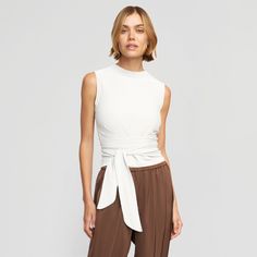 Rumi Cropped Sleeveless Wrap Top Chic Stretch Wrap Top For Layering, Fitted Tops With Tie Waist, Chic Stretch Wrap Top, Sleeveless Top With Tie Waist For Day Out, Summer Wrap Tops For Layering, Sleeveless Tie Waist Top For Day Out, Faux Wrap Top For Layering, Summer Layering Wrap Tops, Elegant Wrap Top For Spring Layering