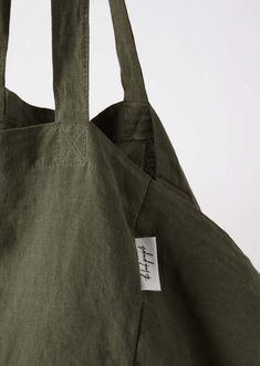 Your go-to carry-all bag. Designed for beach days, market trips and weekends away. Made from 100% soft linen in the perfect size to fit all your daily essentials. Product Specs 100% linen Interior pocket Lined base Machine washable 14 x 14 x 14" Lightweight, unstructured style Available in latte, slate blue, bottle green and chocolate Care Instructions For small stains, spot clean using cold water and a mild soap or detergent. Alternatively, machine wash cold on gentle cycle, do not bleach. Stea The Beach People, Linen Tote Bag, Anna Beck, Linen Interior, Green Bottle, Blue Bottle, Bottle Bag, Bottle Green, Hair Fragrance