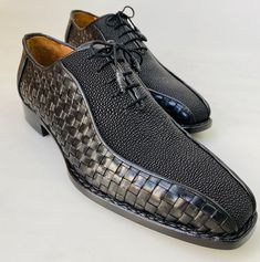 New TucciPolo Half Genuine Black Stingray with Weave Leather Prestigiously HandWelted Oxford Mens Luxury Shoes - offering superior comfort and exquisite design. Shop TucciPolo Collection of top quality mens Luxury Handmade Italian leather designer Shoes. Buy now and pay in 3-12 Month with no hidden fees using AFFIRM at checkout Leather : Stingray & Weave leather Sole: Double Leather Sole Construction: Handwelted soleColor: Black This is a made-to-order product. Each pair will be made upon re Luxury Fitted Black Men's Shoes, Luxury Men's Shoes With Stitched Sole And Pointed Toe, Luxury Pointed Toe Men's Shoes, Luxury Black Men's Shoes With Stitched Sole, Luxury Men's Pointed Toe Leather Shoes, Modern Black Oxfords For Galas, Designer Black Oxfords With Rubber Sole, Luxury Black Dress Shoes With Leather Lining, Luxury Black Cap Toe Leather Shoes