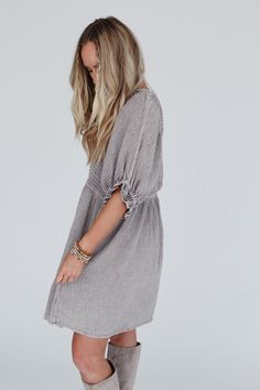 So cute and comfy, you’re going to want to twirl and dance in the Quinn Puff Sleeve Mini Dress because of how confident you feel in it! This dress will have you feeling effortlessly boho-chic all day long because it features: Comfortable textured mineral washed fabric Relaxed and loose babydoll silhouette with mini dress length So cute pintuck detailing along the bodice Classic rounded neckline Elbow length sleeves with cute gathered ruffled bottom edges So cute boho outfit pair with: Tattoo Bra Bohemian Dress With Smocked Back And Puff Sleeves, Casual V-neck Dress With Gathered Sleeves, Relaxed Fit Ruffled Dress For Day Out, Relaxed Fit Dress With Ruffles For Day Out, Relaxed Fit Ruffle Dress For Day Out, Casual V-neck Peasant Dress For Spring, Spring Flowy Peasant Dress With Puff Sleeves, Bohemian Puff Sleeve Dresses For Fall, Fall Bohemian Puff Sleeve Dresses