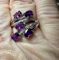 Gemstone: genuine natural oval cut amethyst Size: 6mm x 4mm x 2mm Weight: 1.25cttw approx. Accent stones: round cut white topaz Metal: .925 stamped Sterling Silver, rhodium plated & 18kt gold played Size: adjustable 8 1/2 to 10 Weight: 3.8g Oval Amethyst Ring With Cubic Zirconia And Gemstone Accents, Oval Amethyst Ring With Cubic Zirconia Accents, Oval Purple Diamond Gemstones, Oval Amethyst Gemstones With Gemstone Accents, Oval Amethyst Gemstones For Fine Jewelry, Oval Amethyst Gemstones With Accents, Purple Oval Stone Jewelry, Purple Oval Stones Jewelry, Purple Oval Jewelry With Stones