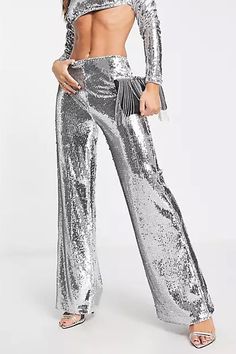 Features of Silver Sequin Set 💖1. Glittering Sequins The silver sequin set, adorned with high-quality and dazzling sequins, sparkles brilliantly in the light. Its shiny effect ensures you stand out from the crowd, adding a touch of glamour to your presence.💖2. Comfortable Fit Victray's silver sequin suit is not only charming but also crafted from soft and elastic materials, guaranteeing both style and comfort. With this suit, you can move freely and confidently, enjoying the event without any Glamorous Shiny Bottoms For Spring, Metallic Bottoms With Contrast Sequin For Party Season, Disco Style Glitter Pants For Party, Spring Party Embellished Pants, Glamorous Festive Pants, Glamorous Glitter Pants For Party, Festive Party Bottoms With Sequins, Shiny Fitted Bottoms For Party Season, Shiny Bottoms For Party Season