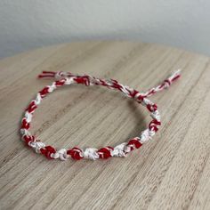 A Handmade Bracelet Or Anklet Woven With Shades Of White And Red Colors. A Friendship Or Statement Bracelet Perfect For This Summer! Approx. 9 Inches/ 30 Centimeters Long. 10 Woven Bracelets For $25. White Casual Bracelets For Valentine's Day, White Casual Friendship Bracelets For Valentine's Day, Casual White Bracelets For Valentine's Day, Casual White Friendship Bracelets For Valentine's Day, Boho Charm Bracelet, Coach Earrings, Alex And Ani Bangles, Simple Bangle, Elephant Bracelet