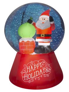 an inflatable snow globe with a santa clause and chimney on the inside, says happy holidays