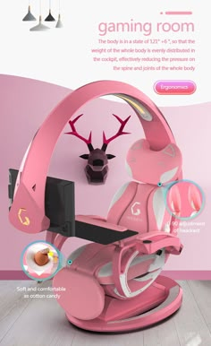 the pink chair is sitting in front of a wall with deer head mounted on it