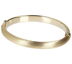 This 18K yellow gold-clad sterling silver bangle deserves everyday mixing and matching with your other pieces. From Veronese Collection® Jewelry. Fine Jewelry Yellow Gold Oval Bangle, Elegant Oval Hallmarked Bangle, Oval Bangle With Polished Finish For Anniversary, Yellow Gold Wedding Bracelets With Shiny Finish, Yellow Gold Bracelets With Shiny Finish For Wedding, 14k Gold Oval Bangle For Anniversary, Oval 14k Gold Bangle For Anniversary, Elegant Oval Yellow Gold Bangle, Oval Hallmarked Bangle For Anniversary