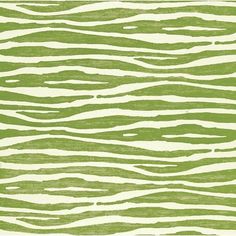 a green and white rug with wavy lines