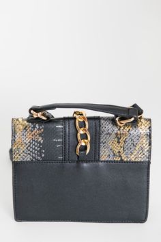 Snakeskin Cross Body Bag Gold Tone Chain & Studs Chain Hardware Detachable & Adjustable Crossbody Strap Fold Over Flap Top Closure Turn Lock Fastening Interior and Exterior Slot Pocket 2 Compartments Measures: 8"W x 6"H x 4"D Chic Evening Bags With Chain Print, Chic Evening Bag With Chain Print, Chic Quilts, Black Chain, Rebecca Minkoff Mac, Black Cross Body Bag, Chain Bags, Cross Body Bag, Fold Over