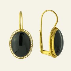 Sensual minimalism. This bold Victorian design features a black onyx stone in a classic 24k vermeil gold open work setting. European backs for pierced ears. Size: 1 1/4 inch. Formal Black Enamel Gold-plated Jewelry, Formal Gold-plated Black Enamel Jewelry, Formal Gold Plated Black Enamel Jewelry, Gold Onyx Jewelry With Black Enamel, Formal Onyx Gemstone Earrings, Classic Gold Onyx Jewelry, Gold Onyx Pierced Earrings, Black Gold-plated Earrings, Black Gold-plated Pierced Earrings