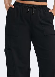 Embrace roomy wide legs and a stretchy fit for ultimate comfort, paired with a flattering high waist for added style. Whether it's grocery runs, lazy Sundays, or a casual hangout, these joggers have you covered in relaxed elegance. Dance Leggings, Relaxed Elegance, High Neck Bodysuit, Dance Pants, Crop Top Bra, Lazy Sunday, Racerback Bra, Short Leggings, Sports Top