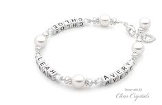 Diamonds & Pearls Mother's Bracelet Elegant Silver Name Bracelet With Round Beads, Classic Personalized Pearl Jewelry, Classic Personalized White Pearl Bracelet, Elegant White Personalized Jewelry, Elegant Personalized Jewelry With Round Beads, Elegant Personalized Sterling Silver Beaded Bracelets, Elegant Personalized Round Bead Jewelry, Elegant Silver Engraved Beaded Bracelets, Elegant Engraved Silver Beaded Bracelets