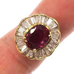 OnlyGoldRings.... Item Description  This auction is for an 18k solid yellow gold Ruby Diamond ring. Contains a 8.9mm x 7.2mm ( 1.50ct ) natural Ruby of very fine quality. Accented with natural white clean long baguette Diamonds. The ring measures 17.25mm long on the finger and weighs 4.86 grams. Fitted for a size 5.75 finger  Metal: 18k gold / Gram Weight: 4.86 grams / Ring Size: 5.75      Terms of Sale Our return policy is all customers are given a 14 day return option unless specified. We are not responsible for any taxes or added fees after your purchase has been made. Shipping Information All customers are offered a choice in shipping options. We do offer combined shipping. All purchases are insured against loss or damage. All items will be shipped within 2 days after checkout Mon-Fri. Ruby Diamond Ring, Lace Wedding Dress With Sleeves, Ruby Diamond Rings, Baguette Diamonds, Ruby Diamond, Diamond Halo