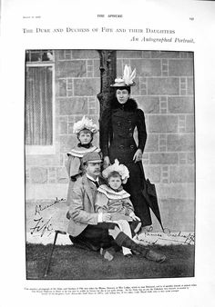 an old black and white photo shows three women in hats with one woman sitting on the ground