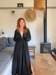 Switch to vacay mode anytime with the Goddess - Black Kaftan Maxi Dress. This undeniably sexy, breezy maxi dress will have you dreaming of the wind in your hair, the sound of the ocean waves, and the sand under your feet. Experience blissful comfort and breathability whether you’re at home or on vacay with the gorgeous flowy long dress and laid-back loose fit. Crafted in 100% soft, lightweight rayon, this dress features flawless tie-dye patterns and is perfect for tropical beachside vacations, h Fitted V-neck Breezy Maxi Dress, Chic Floor-length Beach Dress For Vacation, Beachwear V-neck Maxi Dress For Date Night, Fitted Maxi Length Dresses For Vacation, Chic Floor-length Dresses For Beach Season, Chic Floor-length Beach Dress For Spring, Vacation Midi Dress For Brunch, Fitted Maxi Dress For Vacation, Chic Spring Floor-length Beach Dress