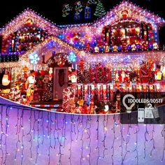 a house covered in christmas lights and decorations