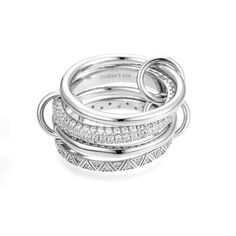 Elevate your jewelry collection with our stunning Silver Multi-Link Connected Ring. This unique stacking ring captures the essence of luxury with its interconnected, 925 silver bands that exude elegance and sophistication. Designed to symbolize eternal bonds, each interlocking ring adds a touch of modern minimalism while creating a bold, statement-making piece. Perfect as an everyday accessory or as a standout cocktail ring, this timeless design seamlessly blends high fashion with effortless wea Connected Rings, Cocktail Original, Maximalist Jewelry, Interlocking Ring, Luxury Ring, Ring Shots, Linking Rings, Stylish Rings, Luxury Rings