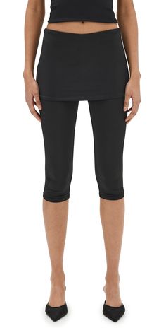 Find SANDY LIANG Solow Capris on Editorialist. Fabric: Lightweight activewear jersey,Skirt overlay,Shell: 90% polyester/10% spandex,Wash cold,Imported, Brazil Fitted Activewear For Yoga With Elastic Side Panels, Fitted Bottoms With Elastic Side Panels For Sports, Activewear With Elastic Side Panels For Spring, Black Knee-length Athleisure Activewear, Fitted Training Bottoms With Elastic Side Panels, Fitted Capri Length Workout Activewear, Fitted Yoga Bottoms With Elastic Side Panels, Black Compressive Bottoms For Spring, Moisture-wicking Fitted Mid-thigh Bottoms