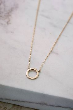 "\"What goes around, comes around. A minimal karma circle necklace made with love! Just a simple way to share happy thoughts. Go on and share yours. Who knows... Anything is possible!\" --Fairy Goldcharm ♥♥ CUSTOMIZATION ---> Available in yellow, white, and rose gold. ♥♥ DETAILS The circle's diameter is 0.9cm (approx. 0.35in). ♥♥ CHAIN ---> The karma circle is presented with a gold chain. ---> The whole necklace is 40cm long (approx. 16in). ---> The chain used is 0.8mm thick (approx. Minimalist Yellow Gold Open Circle Necklace, Minimalist 14k Gold Filled Round Necklace, Minimalist 14k Gold Open Circle Necklace, Dainty Open Circle Everyday Necklace, Dainty Open Circle Necklace For Everyday, Dainty Everyday Open Circle Necklace, Minimalist Circle Necklace For Anniversary, Minimalist Yellow Gold Circle Necklace, Simple Everyday Circle Necklaces