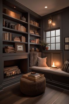 a living room filled with lots of books and furniture