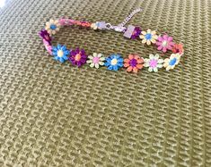 The Honey Kids Floral Choker is a dainty, floral accent choker. Recommended for children 3 years and older. **Please select the age of child in the notes section of check out to receive a custom size** For Children 3-6 years old 6.5 inches with 3 inch chain extension For Kids 7 - 12 y/o 8 inches with 3 inch extension 13 and older- Adult size choker 12 inches Kids Flower Necklace, Kids Flower Choker, Kids Choker, Kids Choker Necklace, Kids Flower Necklace, Kids Necklace, Kids Jewelry, For kids Toddler Braided Hairstyles, Toddler Braids, Floral Choker, Jewelry For Kids, Flower Choker, Gold Chains For Men, Kids Necklace, Mens Gold, Choker Necklaces