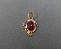 1. Rubellite 18k Gold Pendant 2. Made to Order 3. Gemstone - Natural Rubellite 4. Jewelry Type - Charms Pendant 5. Total weight - 0.555 Gram Approx 6. Rubellite Weight - 1.00 Carats 7. Gold Weight - 0.355 Grams Approx. 8. Gold Purity - 18k 9. Pendant Bails Outer Size - 5 mm 10. Stone Shape - Oval Shape 11. Ready to dispatch in 1 - 2 days. 12. Handmade Items 13. AAA Quality Pendant 14. 1 Quantity Available 15 Women Pendant 16. Very good shade Pictures are taken under natural and day light. Oval Temple Jewelry For Formal Occasions, High Luster Oval Gemstones For Gifts, Oval Gemstone Temple Jewelry, Fine Jewelry In 22k Gold With Oval Shape, Handmade Oval Gold Gemstones, Gold Oval Tourmaline Jewelry, Yellow Gold Oval Pendant Amulet Jewelry, Gold Tourmaline Jewelry With Cabochon, Red 14k Gold Oval Pendant Jewelry