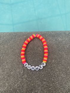 Great to wear on wrist, perfect gift for girls, teens, moms, for birthday, anniversaries, etc. COLOR: Yellow, Orange, Light red, Red, Pink MATERIALS: Beads and clear non-ripping elastic band Trendy Red Jewelry For Birthday, Fun Beaded Stretch Bracelet For Summer, Summer Friendship Bracelets In Orange, Red Beaded Bracelets With Letter Beads For Summer, Summer Playful Beaded Bracelets With Letter Beads, Personalized Red Beaded Bracelets For Birthday, Playful Letter Beads Friendship Bracelets For Summer, Summer Red Beaded Bracelets With Letter Beads, Summer Beaded Friendship Bracelets As Gift