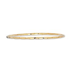 A distinctive twisted diamond-cut texture gives this stylish stackable women's bangle dynamic appeal. Crafted of 14K yellow gold, the 8-inch bangle is 2.5mm in width. Modern Hammered Yellow Gold Bangle, Modern Yellow Gold Diamond Cut Bangle, Modern Gold Bangle With Diamond Cut, Modern Gold Diamond Cut Bangle, Womens Bangles, Stackable Bangles, Jared The Galleria Of Jewelry, Cartier Love Bracelet, Italian Charm Bracelet