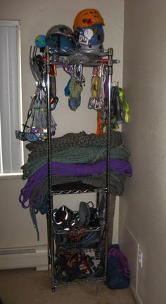 there is a metal rack with many items on it